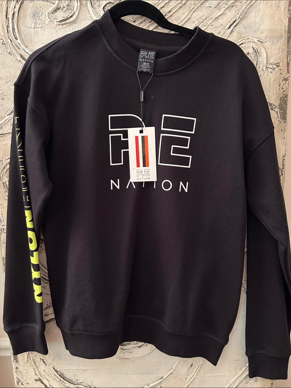 P.E Nation Black Crewneck Sweatshirt with White Logo and Yellow Sleeve Text